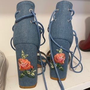 Lace up embroidered heels